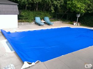 Pool covered with Automatic Pool Reel USA